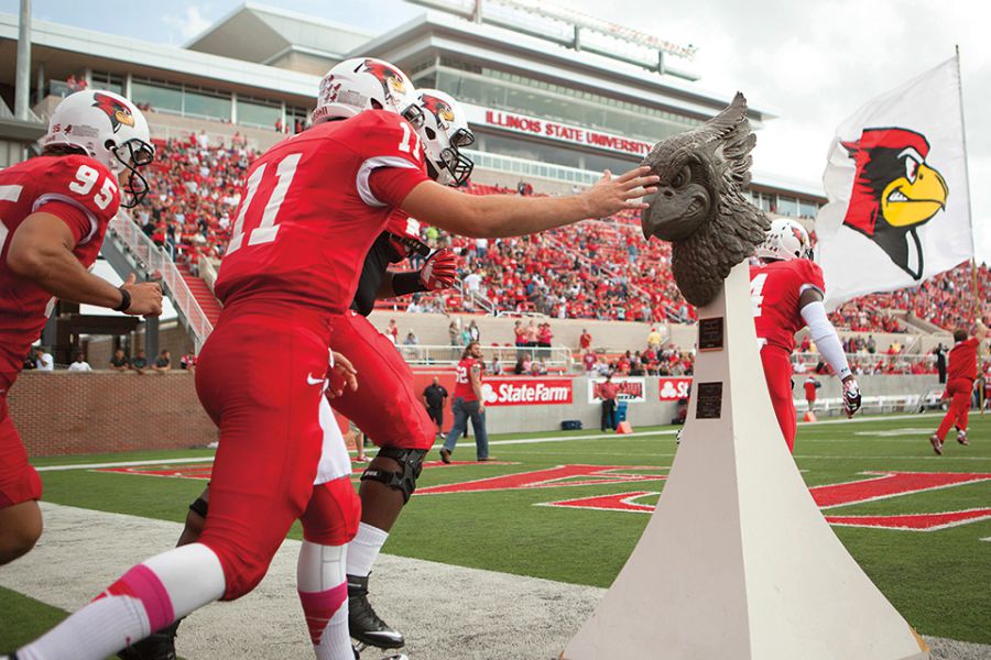 Players run onto Hancock Stadium