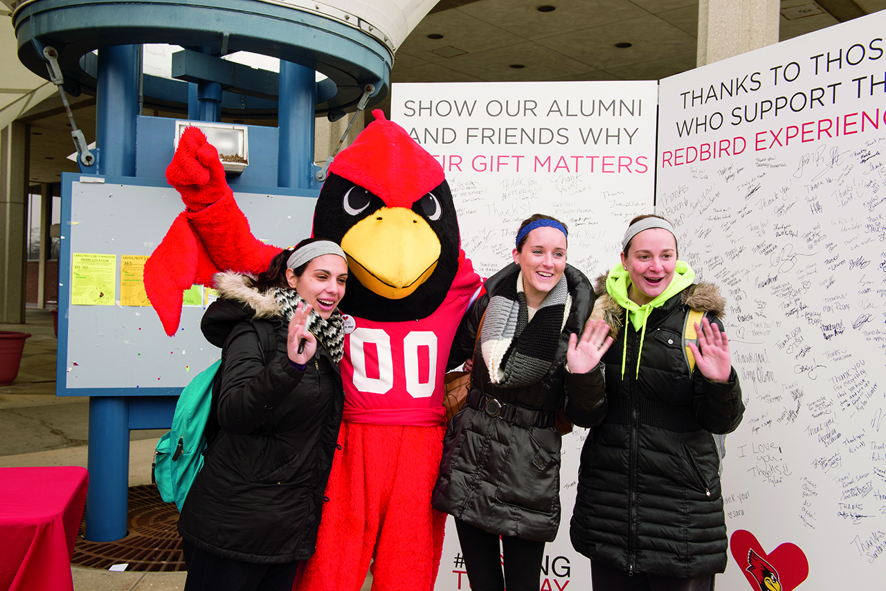 Students pose with Reggie