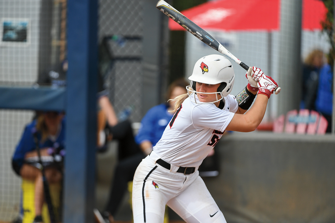 Redbird softball player Mack Leonard is up to bat during a game.